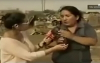 В Перу женщина начала кормить грудью поросенка во время интервью (Видео)