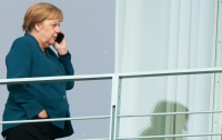 Меркель поговорила с Путиным о подготовке саммита 