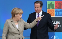 Меркель и Кэмерон договорились сохранить санкции против России