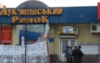 Лукьяновский рынок в столице атакован людьми в черном