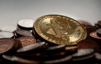 Новая вершина: Bitcoin рекордно подорожал к доллару