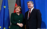 Меркель пригласила Порошенко в гости
