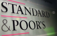 Standard & Poor's прогнозирует падение гривны до 9 грн за доллар