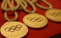 Олимпийские чемпионы возвращают свои золотые медали 