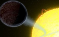 Телескоп Hubble обнаружил удивительную планету, черная как смоль поверхность которой практически не отражает света