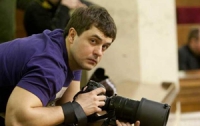 В Киеве зверски убили известного фотокорреспондента Виталия Розвадовского