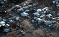 Разрушенные города Чили заваливает мусором и грязью