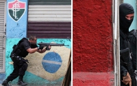 Война полиции и наркоторговцев в трущобах Рио-де-Жанейро (ФОТО)