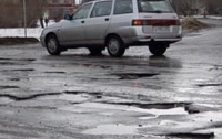Киевская власть будет фотографировать ямы на дорогах