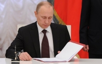 Путин разрешил крымчанам не платить долги украинским банкам