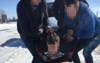 Под Киевом разбойники с ножом ограбили таксиста