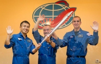 Олимпийский факел впервые полетел в космос