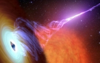 Нейтронная звезда, вращающаяся вокруг черной дыры, может являться источником быстрых радиоимпульсов